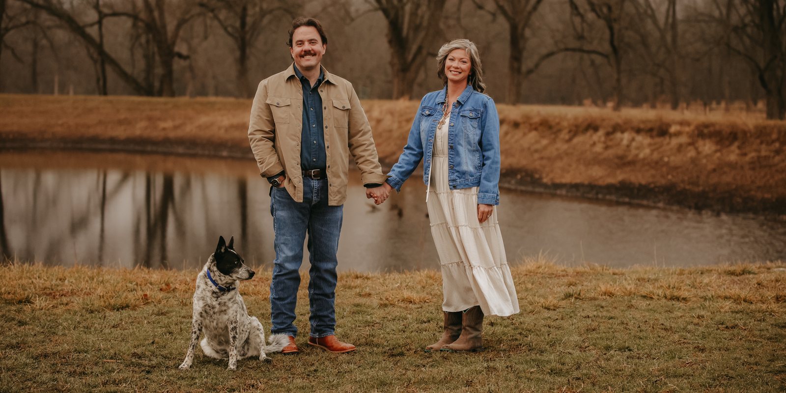 Michael Hopper with his wife and their dog beside a pond outside Tahlequah, Oklahoma
